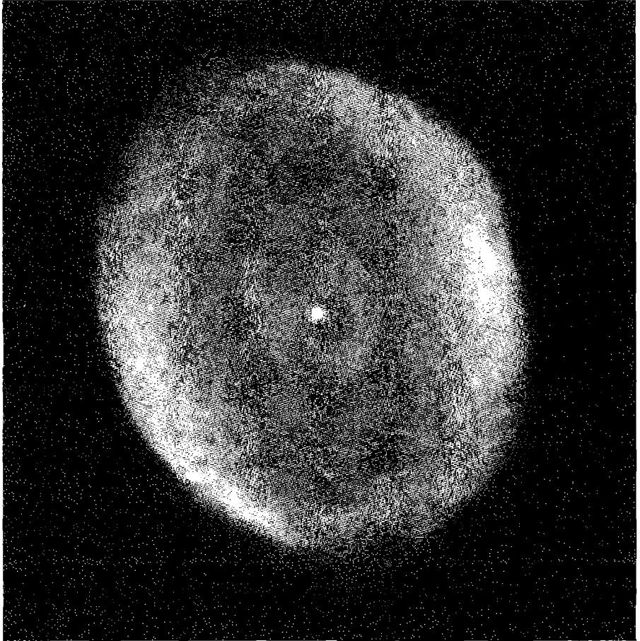 Figure 1.4. The planetary nebula IC 418. Note the fine structure, including the low narrow arc-like filaments, and the second smaller structure within the main nebula. (STScI)